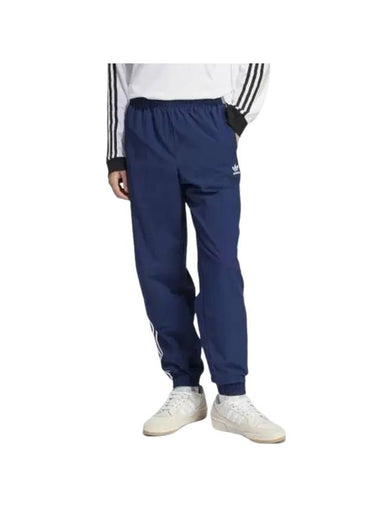 Woven Firebird Track Pants Indigo - ADIDAS - BALAAN 1