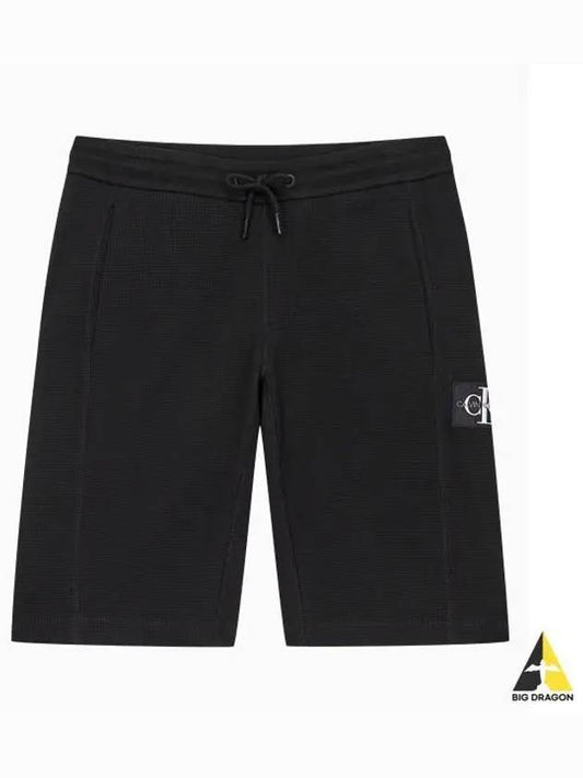 JEANS Men s Black Monogram Badge Logo Waffle Sweat Short Pants J317986 BEH - CALVIN KLEIN - BALAAN 1