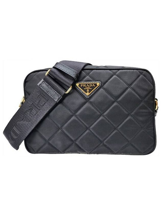 Triangular logo quilted women s camera bag black 1BH089 2DYC - PRADA - BALAAN 1