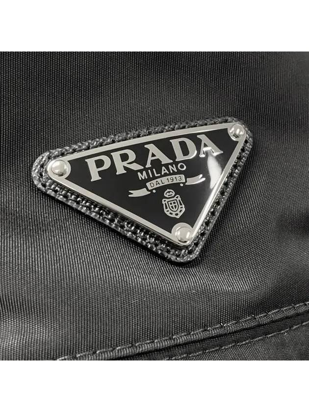 Triangle Logo Re-nylon Bucket Hat Black - PRADA - BALAAN 3