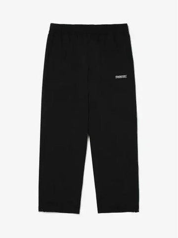 Uni SPORT loose fit woven zipper pants FS2WPE3602XBLK - FILA - BALAAN 1