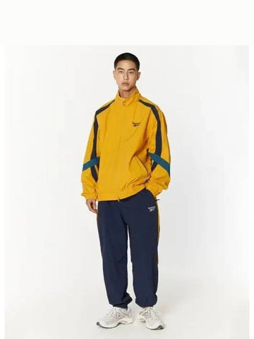 Legend warm up pants navy yellow - REEBOK - BALAAN 1