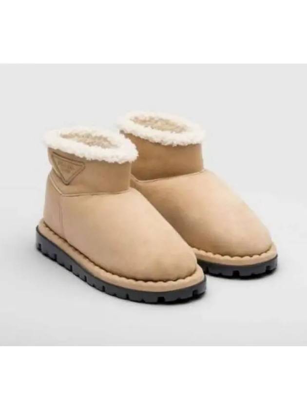 1T217N 1A6 F0379 Shearling Boots - PRADA - BALAAN 1