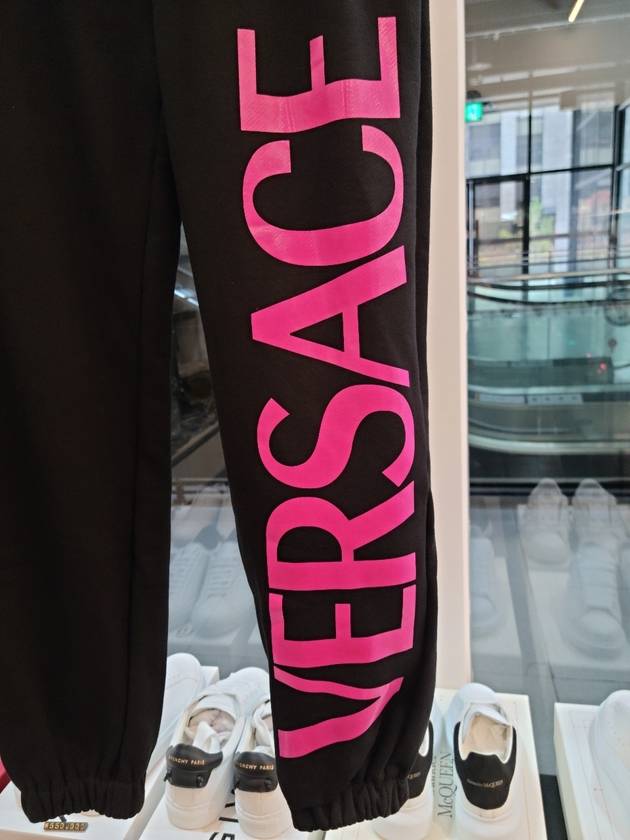 Women's Lettering Track Pants Black - VERSACE - BALAAN.