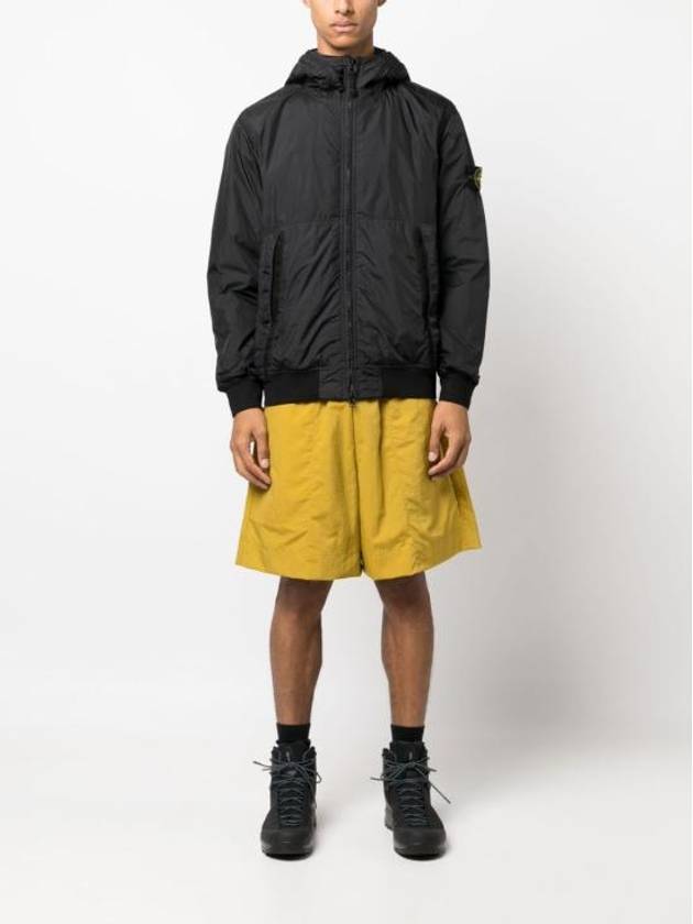 Men's Garment Dyed Crinkle Reps Recycled Nylon Primaloft TC Hooded Jacket Black - STONE ISLAND - BALAAN 3