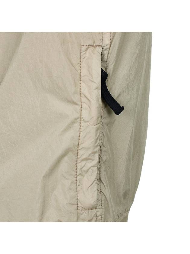 Compass Badge Pleated Windbreaker Sand - STONE ISLAND - BALAAN 11