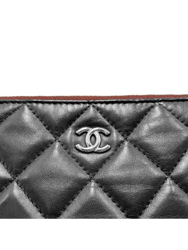 Women s A82545 Black Lambskin Silver Logo New Medium Clutch Bag - CHANEL - BALAAN 7