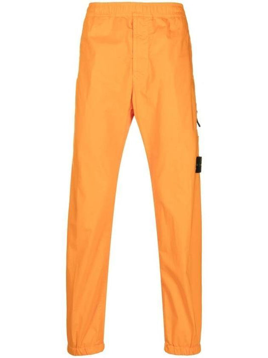 Men's Compass Patch Light Stretch Cotton Canvas Track Pants Orange - STONE ISLAND - BALAAN 1