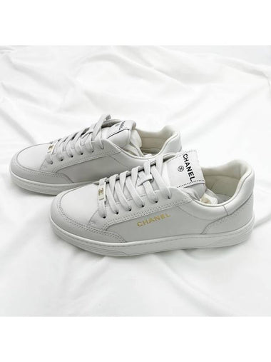 23A Sneakers Gold Logo Lettering White G45085 - CHANEL - BALAAN 1