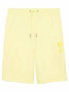 Men's Heart Logo Sweat Shorts Yellow - AMI - BALAAN.