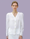 Puff V neck white blousePuff V neck White BL - DAMAGE MNEMONIC - BALAAN 1