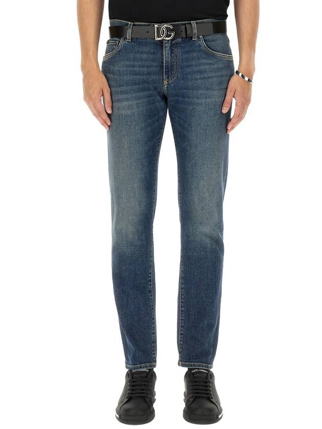 Blue Distressed Slim-Fit Jeans in Cotton Denim Man - DOLCE&GABBANA - BALAAN 2