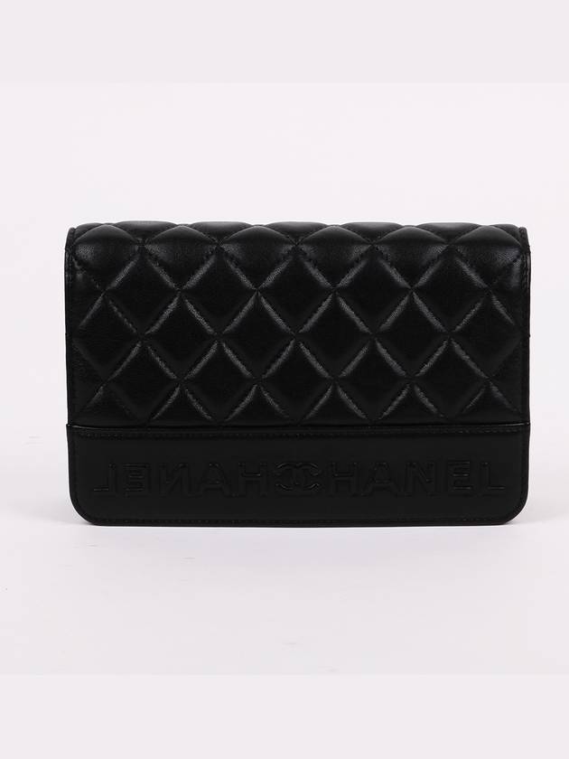 Black calfskin logo WOC cross bag - CHANEL - BALAAN 1