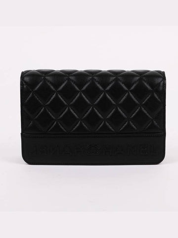 Black calfskin logo WOC cross bag - CHANEL - BALAAN 1