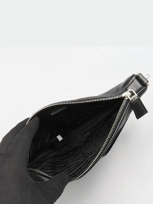 1NE039 Black leather triangle embossed lettering logo pouch clutch bag wrist strap - PRADA - BALAAN 6