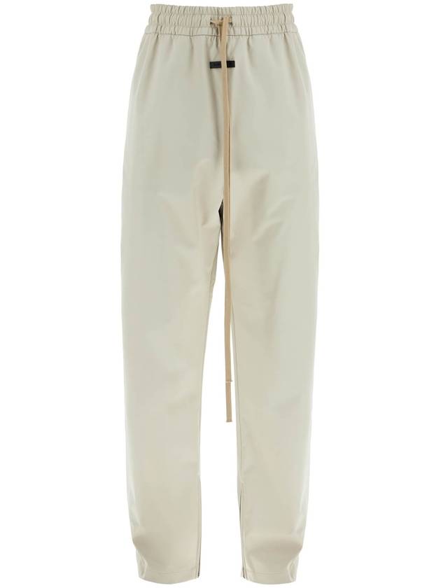 wide leg nylon track pants in cement - FEAR OF GOD - BALAAN 1