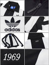 01AB7456OriginalTricot 1969 Track TopBlack White - ADIDAS - BALAAN 9