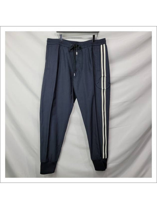 Men's Unbalanced Striped Jogger Pants Navy - MONCLER - BALAAN.