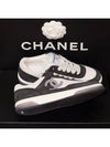 Women's CC Logo Jenny Tennis Sneakers Black White - CHANEL - BALAAN 5