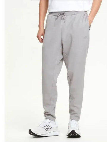 NBMLEBP071 MEN Tech Knit Pants GRAY - NEW BALANCE - BALAAN 1