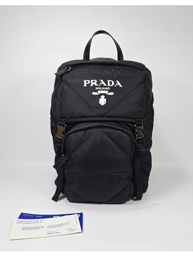 Quilted hooded nylon padded backpack - PRADA - BALAAN 1