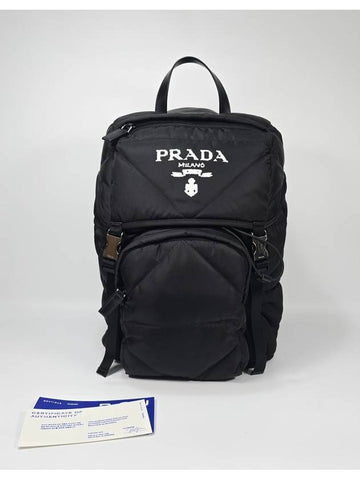 Quilted hooded nylon padded backpack - PRADA - BALAAN 1