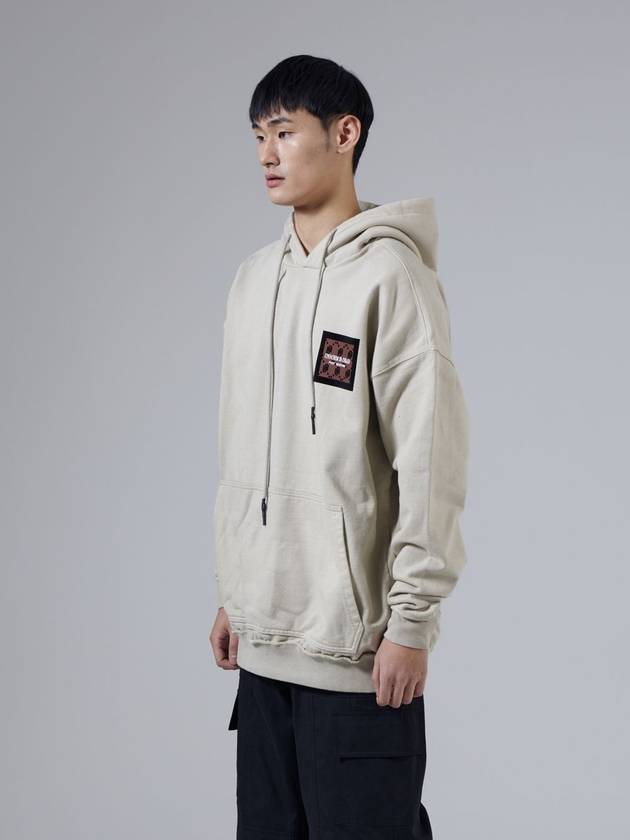 Overfit Monogram Is Dead Hood Beige - UNNORM IS DEAD - BALAAN 3