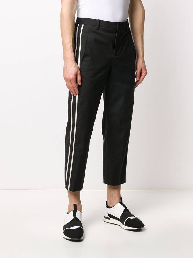 contrasting side panel cropped trousers - NEIL BARRETT - BALAAN 4