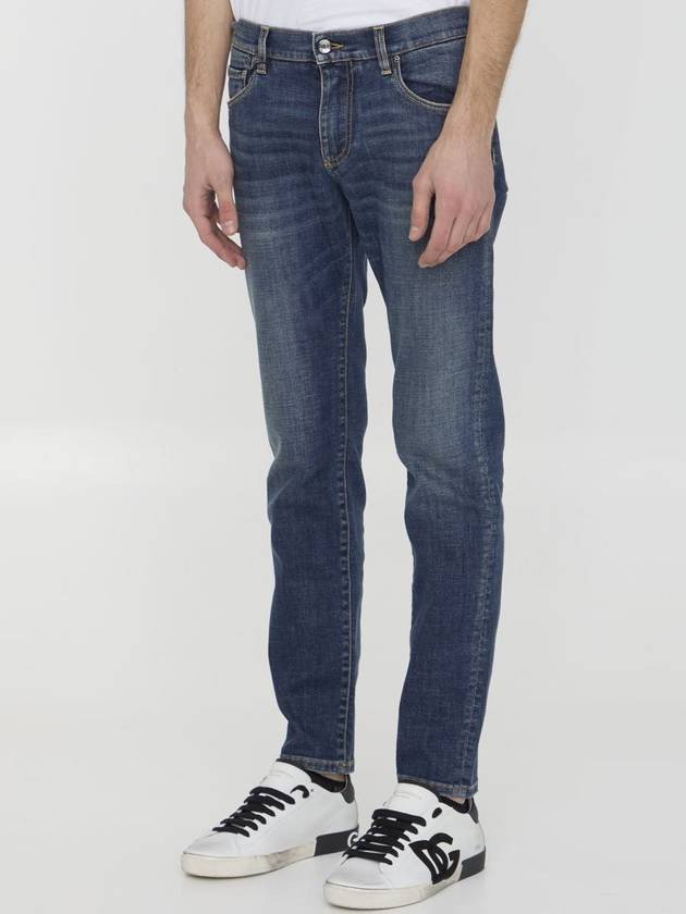 Blue Distressed Slim-Fit Jeans in Cotton Denim Man - DOLCE&GABBANA - BALAAN 3