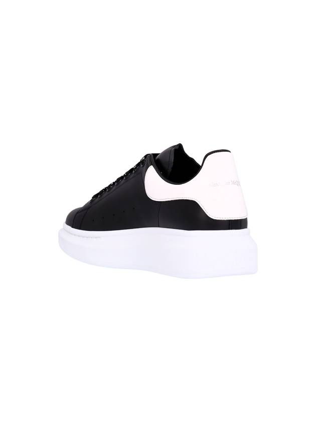 Oversized Leather Tab Low Top Sneakers Black - ALEXANDER MCQUEEN - BALAAN 4