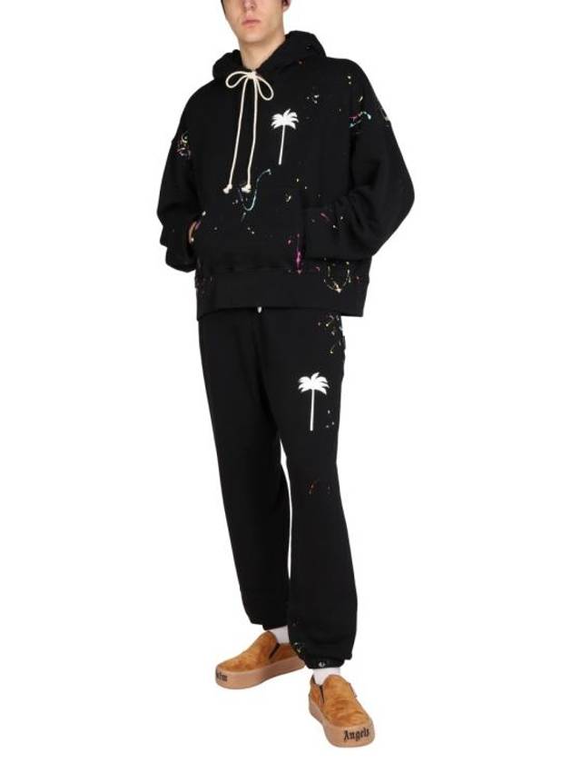 Palm Tree Print Paint Splatter Effect Hoodie Black - PALM ANGELS - BALAAN 3