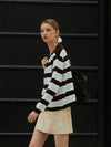 Minnie wearing STRIPE KNIT CARDIGAN BROWN - ANOETIC - BALAAN 7