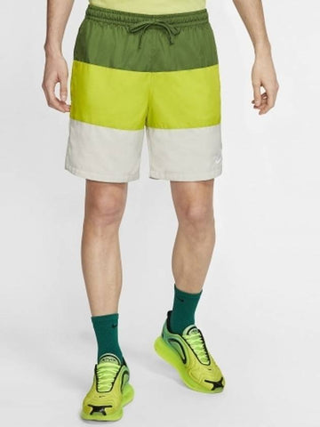 01CJ4486326City Edition Woven Short PantsGreen Green - NIKE - BALAAN 1