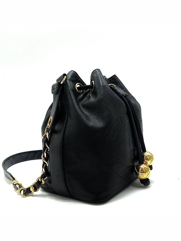 Lambskin timeless drawstring golden ball bucket bag cross - CHANEL - BALAAN 4