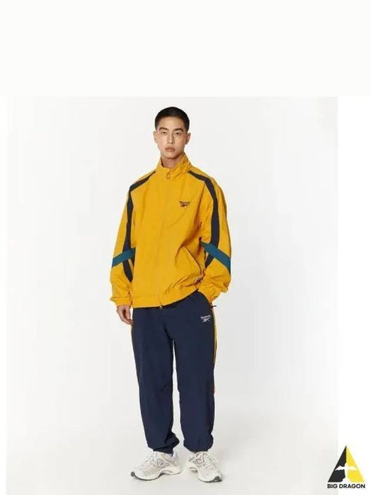 Legend warm up pants navy yellow - REEBOK - BALAAN 1