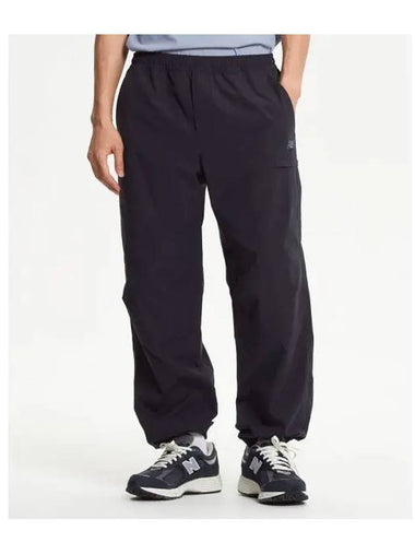 NBNTE31803 UNI ESS Warm up Jogger Pants CHARCOAL - NEW BALANCE - BALAAN 1