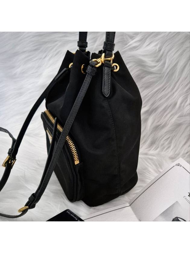 Re nylon triangle logo bucket bag cross black - PRADA - BALAAN 6