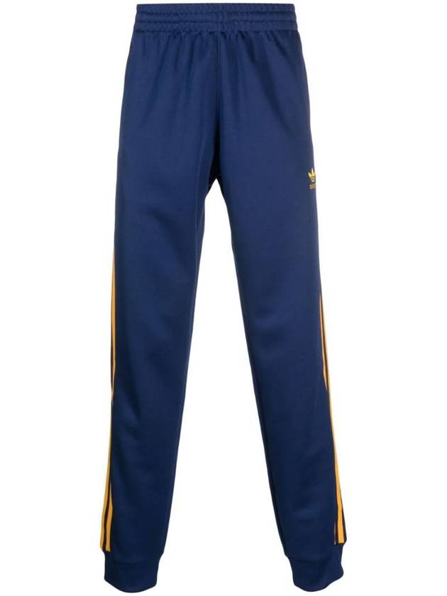 Adicolor Classics SST Track Pants Dark Blue Crew Yellow - ADIDAS - BALAAN 1