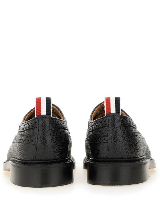 Men's Three Stripes Tab Pebble Grain Long Wing Sole Brogue Black - THOM BROWNE - BALAAN 4