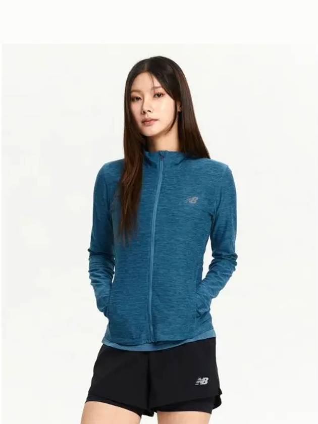 NBMDE4P022 WOMEN Training Zip up LBLUE - NEW BALANCE - BALAAN 1