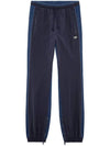 P Bright Wrinkled Nylon Denim Track Pants Blue - DIESEL - BALAAN 1