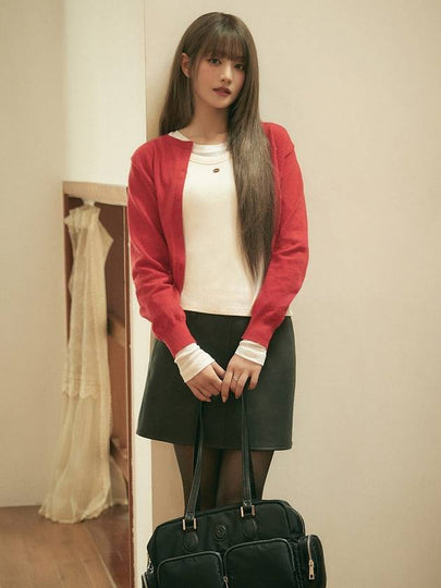 Minnie wearing SOLID ROUND CARDIGAN RED - ANOETIC - BALAAN 2