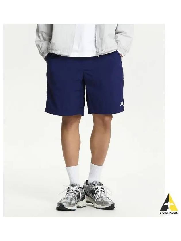 NBNVE22413 UNI Runners 4 5 woven short pants DBLUE - NEW BALANCE - BALAAN 1