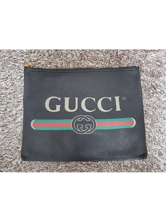 Belted logo print clutch bag - GUCCI - BALAAN 3