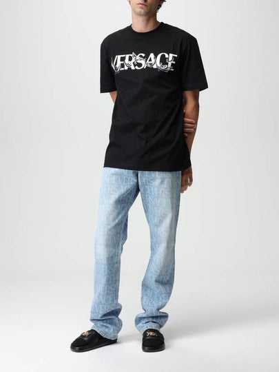 Jeans Versace in denim logato - VERSACE - BALAAN 2