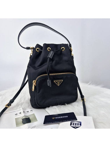 Nylon Tesuto triangle logo bucket bag black - PRADA - BALAAN 1