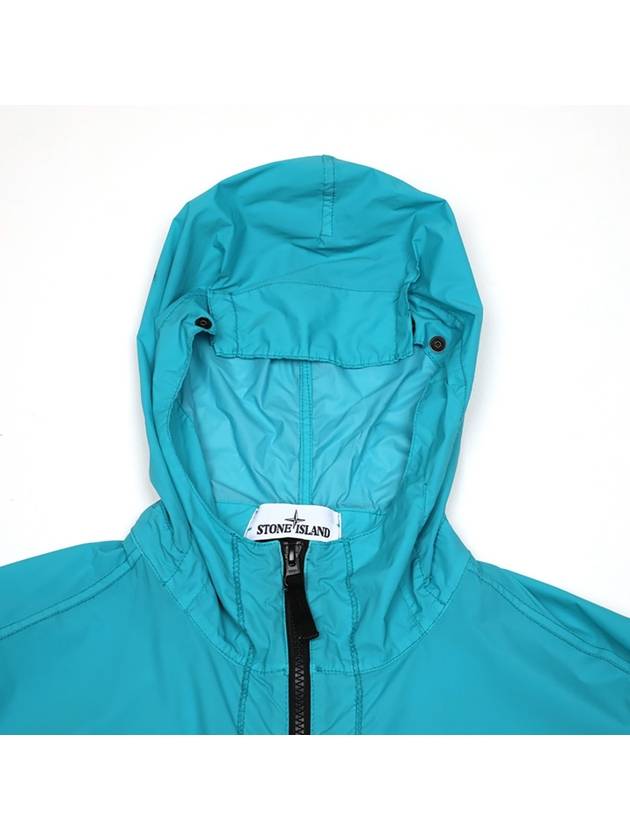 Skin Touch Wappen Patch Hooded Jacket Blue - STONE ISLAND - BALAAN 7