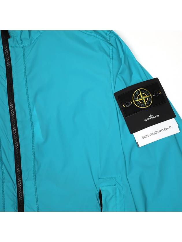 Skin Touch Wappen Patch Hooded Jacket Blue - STONE ISLAND - BALAAN 8