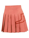 Women's Naomi Golf Pleated Skirt Faded Rose - J.LINDEBERG - BALAAN 1