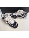 All Over CC Logo Print Suede Low Top Sneakers Black White - CHANEL - BALAAN.